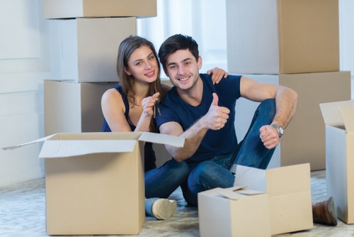 Professional movers handling furniture during a Northend relocation